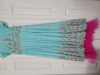 Picture of Blue sequin dress with pink frills