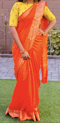 Picture of Orange soft silk saree