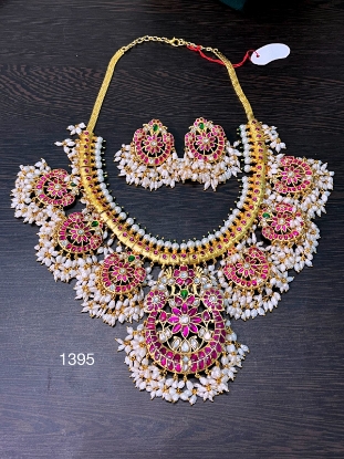 Picture of Gorgeous Brand new Necklace set :Brass metal with gold plating with real kundans & rice pearls