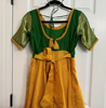 Picture of Kanchi pattu Green and yellow long frock/dress