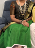 Picture of Green organza lehenga with bandhini dupatta