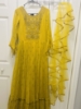 Picture of Mustard yellow long frock along with ruffle Duppatta