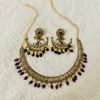 Picture of Victorian purple  kante with matching big earrings.