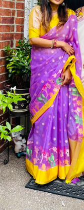 Picture of Lavender & yellow zari kota saree with scallop blouse