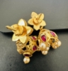 Picture of Real jadau kundan jhumkas with Swarovski pearl drops