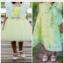 Picture of Green girls bow dress and yellow dress 