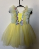 Picture of Green girls bow dress and yellow dress 