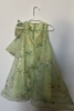 Picture of Green girls bow dress and yellow dress 