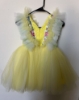 Picture of Green girls bow dress and yellow dress 