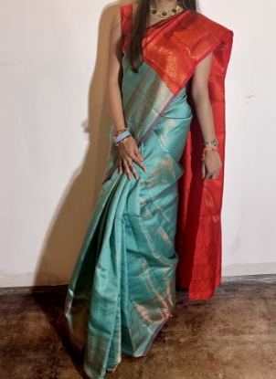 Picture of Dual color Kubera pattu half and half saree