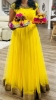 Picture of Yellow netted Long frock