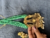 Picture of Jadau kundan lord balaji with original russian onyx emrald 