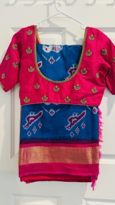 Picture of Ikat patola saree with rawsilk maggam blouse