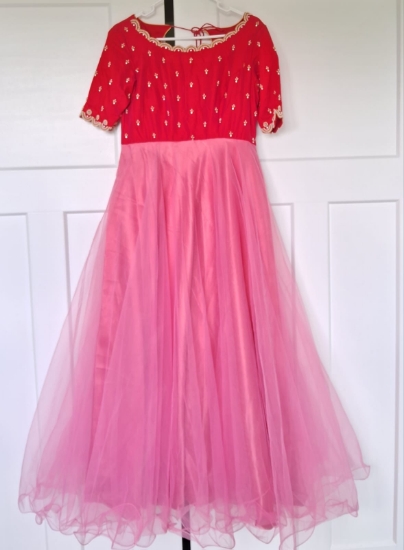 Picture of Pure raw silk maggam work body with multi layered net frock