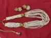 Picture of White beads haaram with Lakshmi Devi side pendants