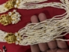 Picture of White beads haaram with Lakshmi Devi side pendants