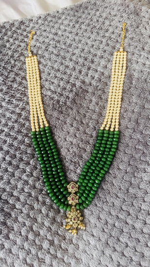 Picture of Gold sheeted Grand 4 lines greens and Swaroski pearls mala