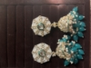 Picture of Statement kundan jhumkas and earrings combo 