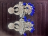 Picture of Statement kundan jhumkas and earrings combo 