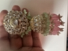 Picture of Statement kundan jhumkas and earrings combo 