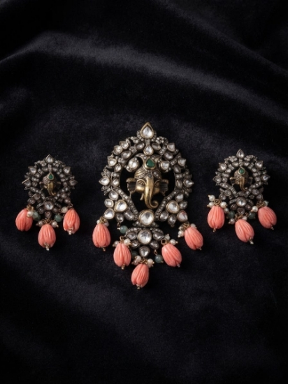 Picture of Coral Ganesha pendant with matching earrings with 4 lines black beads chain
